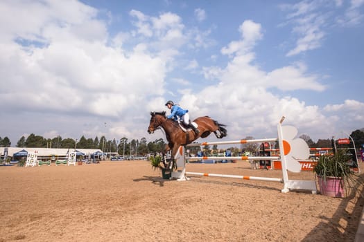 Horse Jumping Nationals Championship  scenes and close-up action of riders men woman at Shongweni Hillcrest outside Durban South Africa  10th Aug 2014
