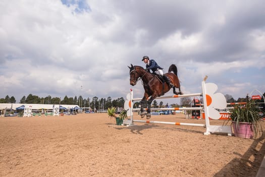 Horse Jumping Nationals Championship  scenes and close-up action of riders men woman at Shongweni Hillcrest outside Durban South Africa  10th Aug 2014