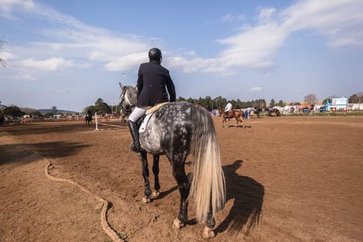 Horse Jumping Nationals Championship  scenes and close-up action of riders men woman at Shongweni Hillcrest outside Durban South Africa  10th Aug 2014