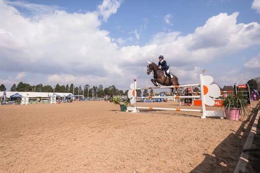 Horse Jumping Nationals Championship  scenes and close-up action of riders men woman at Shongweni Hillcrest outside Durban South Africa  10th Aug 2014