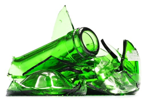 Pieces of broken glass over white background. Recycling.