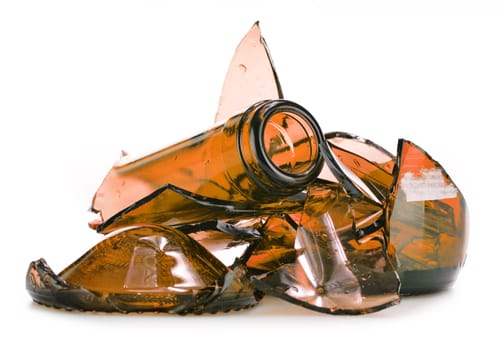 Pieces of broken glass over white background. Recycling.