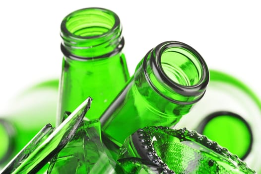 Pieces of broken glass over white background. Recycling.