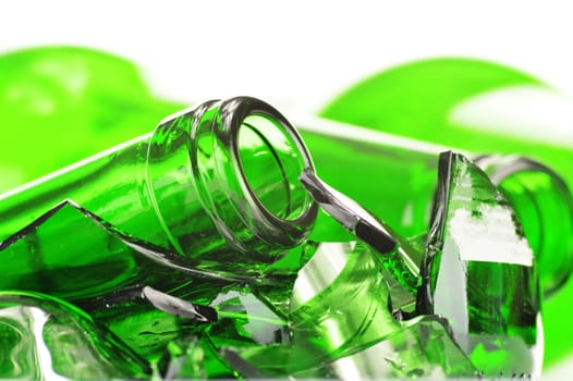 Pieces of broken glass over white background. Recycling.