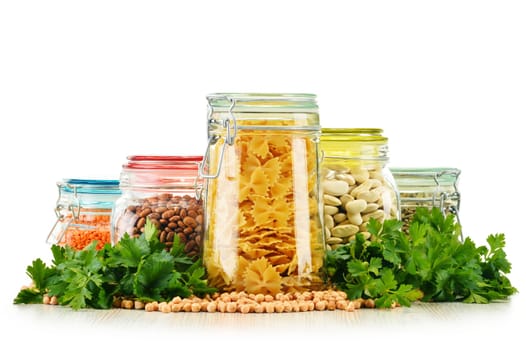 Jars with grain foods isolated on white background