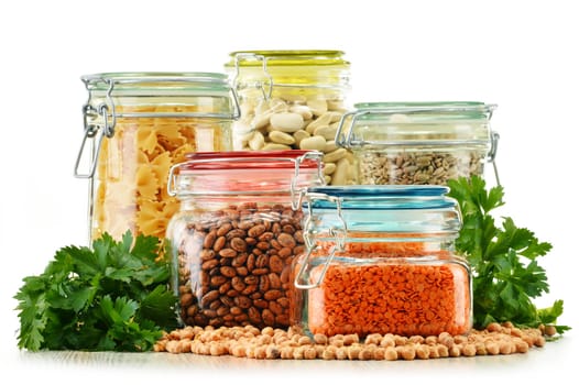 Jars with grain foods isolated on white background