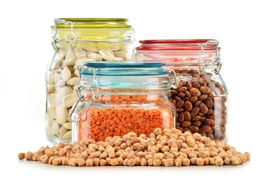 Jars with grain foods isolated on white background