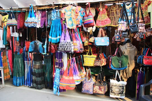 Window display of apparels and bags in a street