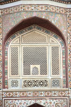Highly decorative etching and mosaic work on marble balcony window at Amer Palace (Amber Fort), Jaipur, Rajasthan, India, Asia