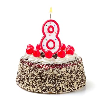 Birthday cake with burning candle number 8