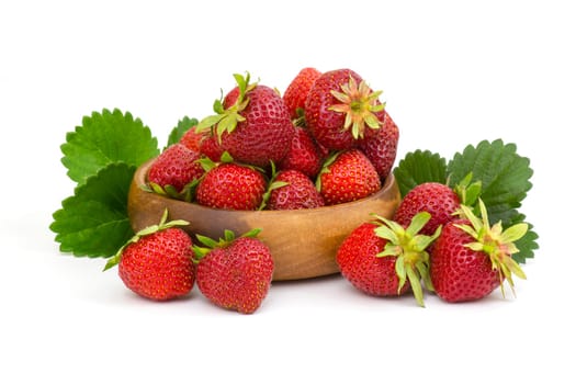 fresh strawberries in a bowl on white background