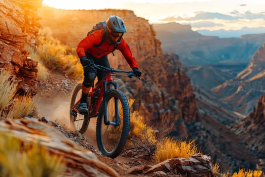 A cyclist rides a mountain bike through rugged trails surrounded by stunning canyons and vibrant sunset hues illuminating the sky.