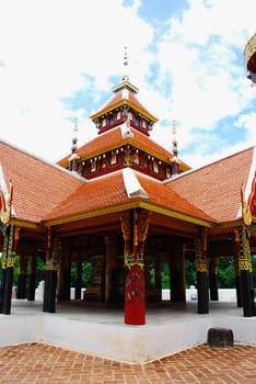 horse carriage and  temple Phrathat Lampang Luang in Lampang, Thailand