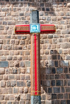 Cross with a picture of Jesus on it in the San Blas neighborhood in Cusco, Peru