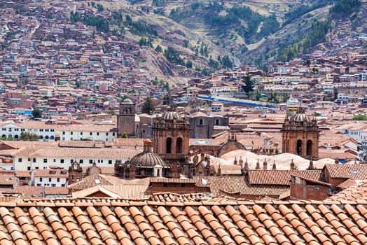 Cityscape of Cusco, Peru with several churches visible