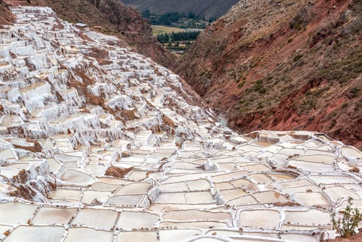 Pools for producing salt near the town of Maras in the Sacred Valley near Cusco, Peru