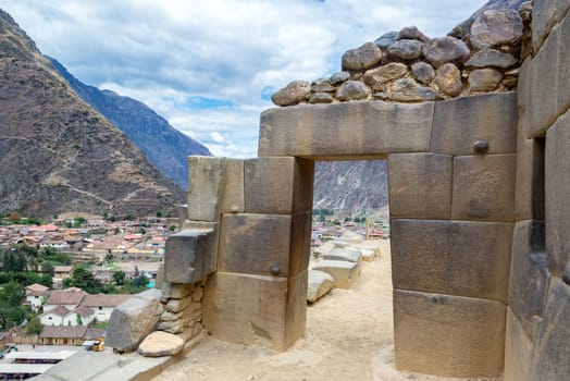 Stone Inca doorway in the ruins of Ollantaytambo, Peru
