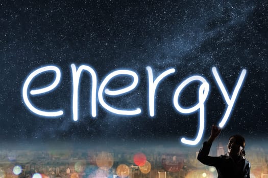 Concept of energy, silhouette asian business woman light drawing.
