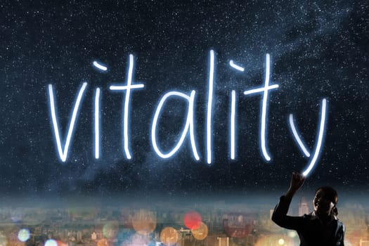 Concept of vitality, silhouette asian business woman light drawing.