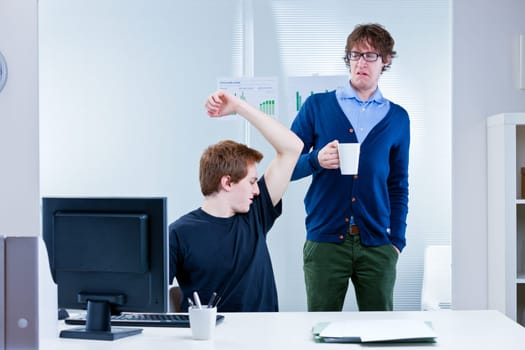boss disgusted because of body odour coming from employee's pit stains and lack of workplace hygiene