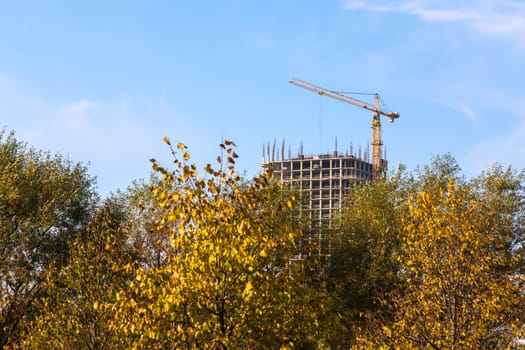 Building crane on construction of city