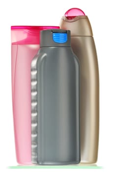 Composition with plastic bottles of body care and beauty products.
