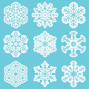 collection of different white snowflakes on blue background