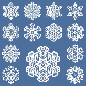 collection of different white snowflakes on blue background