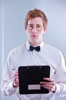 A young redheaded accountant saying that these numbers don't square