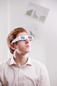 redheaded man with 3d glasses watching into the future