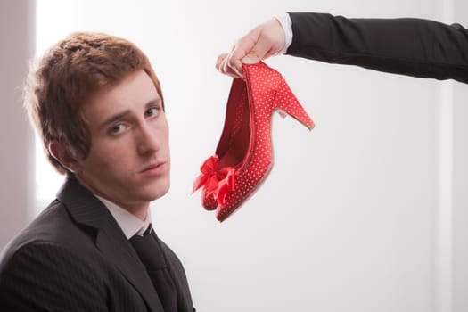 a symbolic businesswoman imposes upon a symbolic businessman