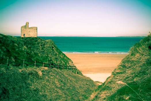 a beautiful fenced path to Ballybunion beach and castle in duotone