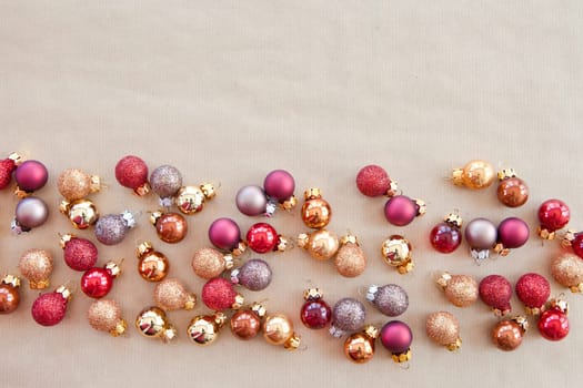 Background from colorful Christmas tree balls on wrapping paper