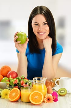 Young woman having breakfast. Balanced diet.