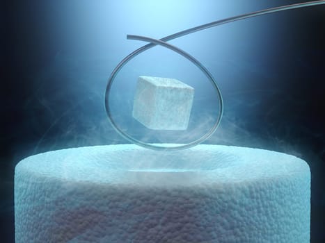 Image concept of magnetic levitating above a high-temperature superconductor, cooled with liquid nitrogen.