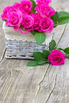 pink roses in a basket