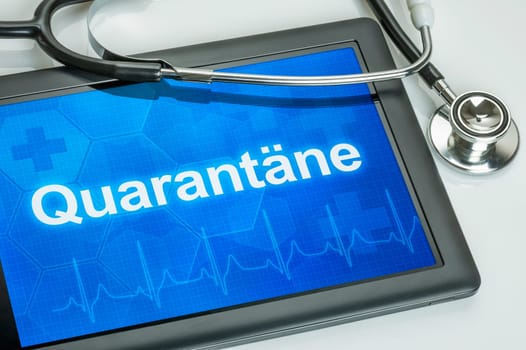 Tablet with the text Quarantine on the display