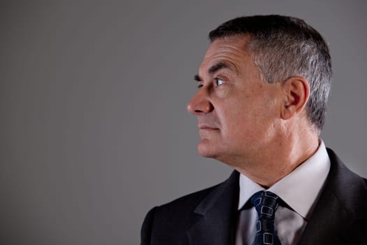 Senior executive or gangster spotting something he pinpointed
