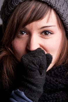A pretty natural smiling girl in winter clothes
