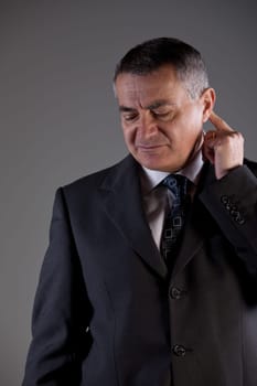 an old man doubtful maybe thinking about a problem or the future