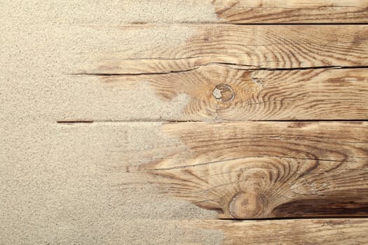 Sand on planked wood. Summer background with copy space. Top view