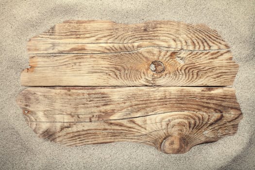 Sand on planked wood for summer. Copy space. Top view