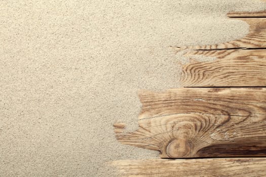 sand on planked wood. summer background with copy space. top view