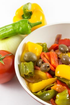 peppers, onions, tomatoes and olives a bit of olive oil and there you have a nice flat