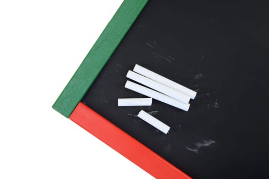 A close up shot of a black board or chalk board