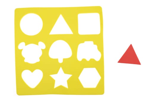 A close up shot of a childs shape finder game