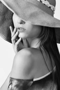 Glamour of Asian beauty with hat, closeup portrait.