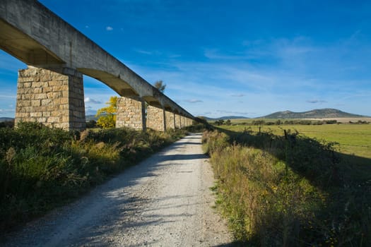 View of a irrigation canal built in concrete and stone, Valdesalor, Caceres, Spain