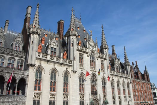 Side view of The Provinciaal Hof (Province Court) is a Neogothical building on the market place in Bruges (Belgium)