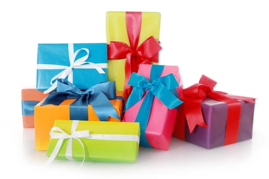 Assorted Color Gift Boxes with Ribbons Isolated on White Background.
